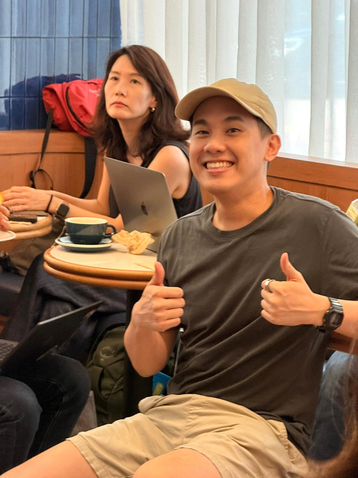 Eric Wong giving a thumbs up during the DeepSeek OpenCode event